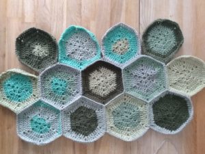 Blue and green crocheted hexagons